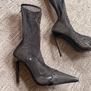 Brand new never worn Elegant Black fishnet Stiletto Heels